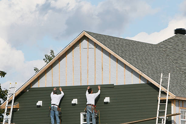 Professional Storm Damage Siding Repair technician working in Melfa, VA